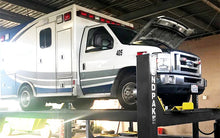 Load image into Gallery viewer, BendPak HDS18E Standard Four-Post Lift (18,000-lb. Capacity)